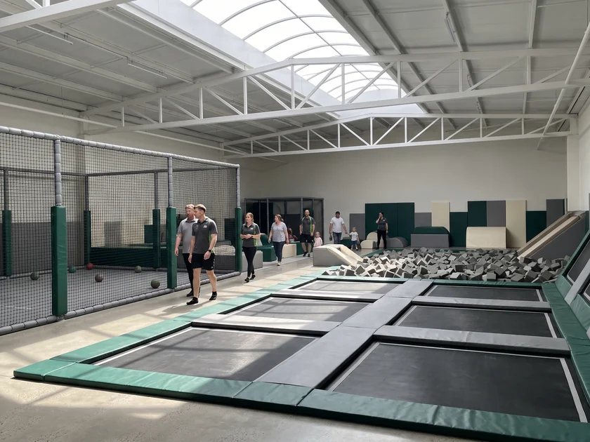 Trampoline court with dodgeball netting and foam pit