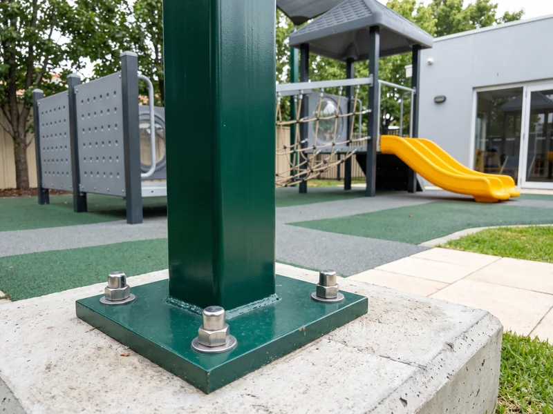 Surface-mount base plate on a concrete slab