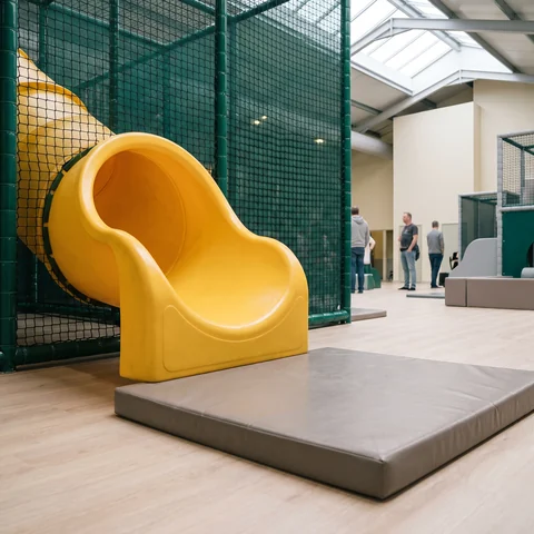 Yellow rotomolded tube slide exit