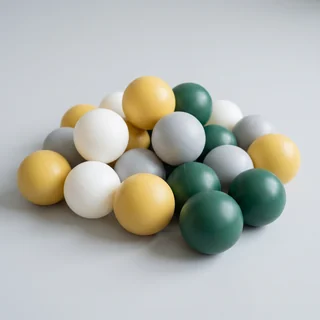 Hollow PE play balls in yellow, white, grey and evergreen