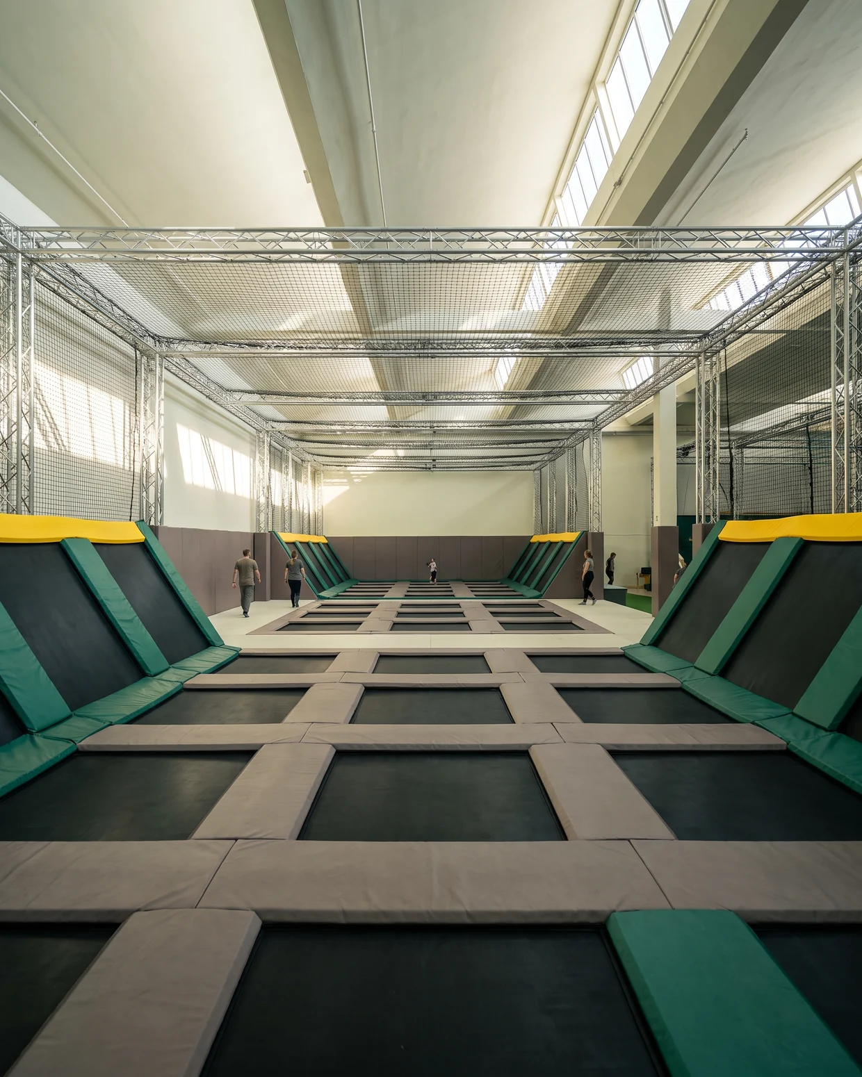 Dodgeball court of jump beds inside black knotless netting